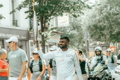 Sri Lanka born celebrity baker Tharshan Selvarajah carries Olympic Torch